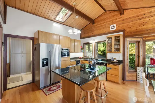 Kitchen with granite countertops and large island