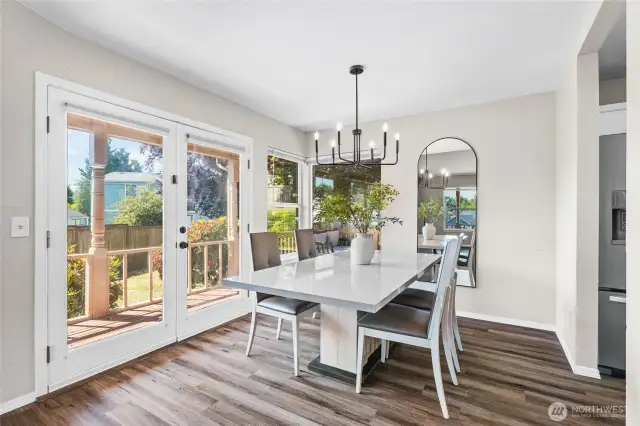 Dining room with french doors to the back deck.