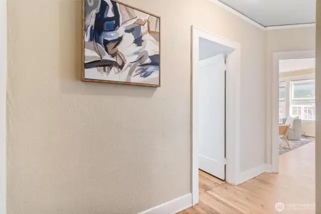 Open concept layout. Hallway leading to the bedroom.