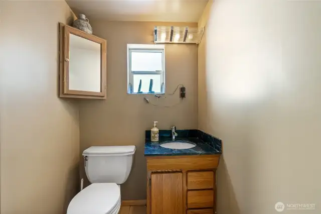 No fighting for the bathroom with two commodes on the main floor!