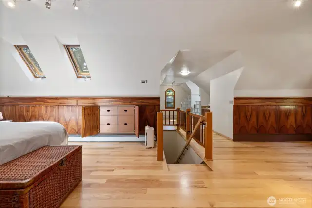 Skylights allows for worthy illumination of the custom built in cabinetry- an elegant storage solution for a clean aesthetic space.