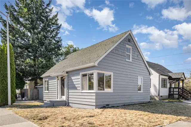 Enjoy living on a corner lot in a home brimming with character.