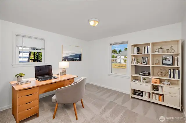 Versatile main-level room, perfect as a bedroom or office.