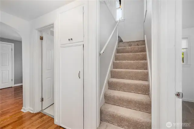 Staircase leading to two spacious upstairs bedrooms.