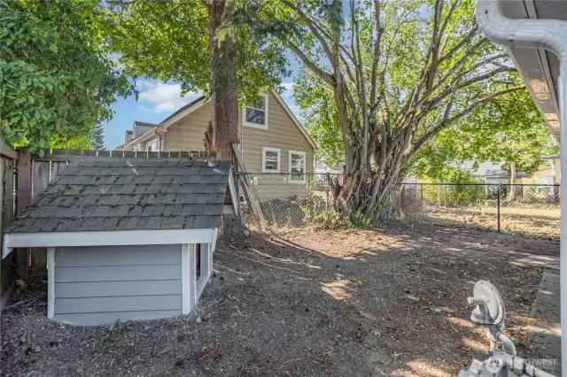 The fully fenced low maintenance backyard is quaint and private, ready for your personal touch!