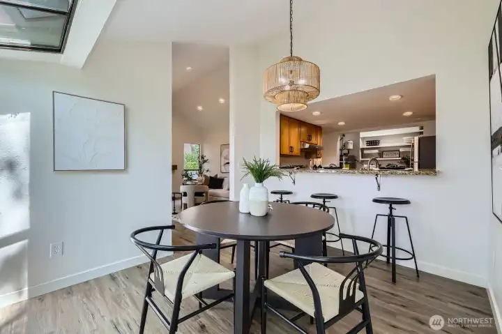 Separate Dining & Bar Soaked In Light From Windows