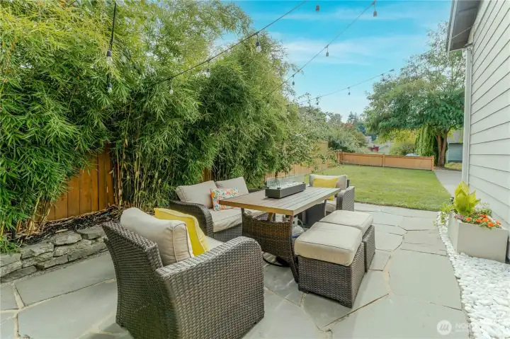 Another view of the patio, looking out toward the alley and garden—offering privacy, potential, and a canvas ready for your outdoor vision to take root