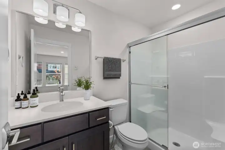 Bedroom with ensuite bathroom on the main level
