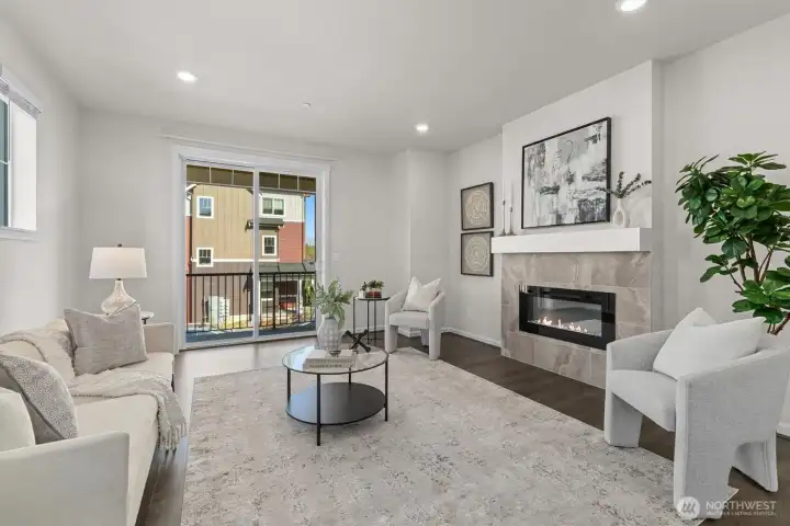 The living room opens to a private balcony