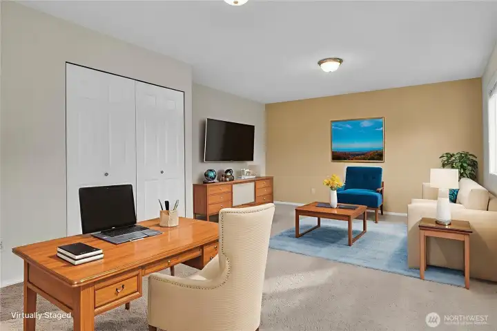 .....set up the same room as a home office with an area for gaming, movie watching, kids play area. With this much space, there are endless possibilities! (virtually staged).