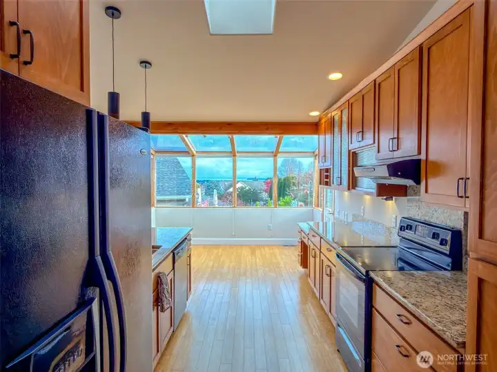 On a less cloudy day, the snow-capped majestic Mount Baker is visible through the sunroom windows.