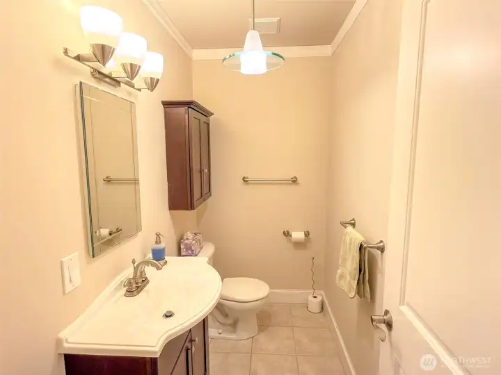 Handy half bath located off hallway closest to great room.