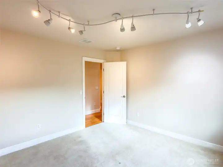 Second bedroom at the beginning of the second hallway.