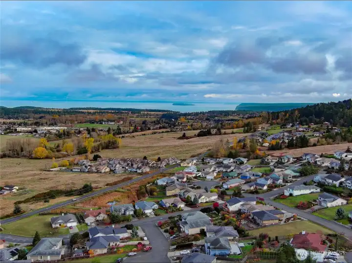 31 Opal Lane is the third home from the right side bottom of the photo frame, the one with the vacant lot directly behind.