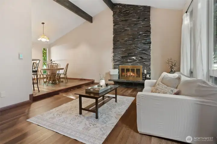 Living room showing part of dining room