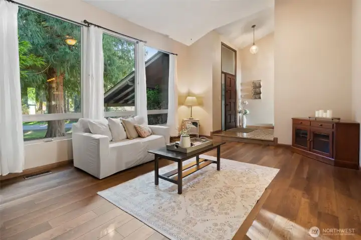 The bay windows add wonderful light to the living room.