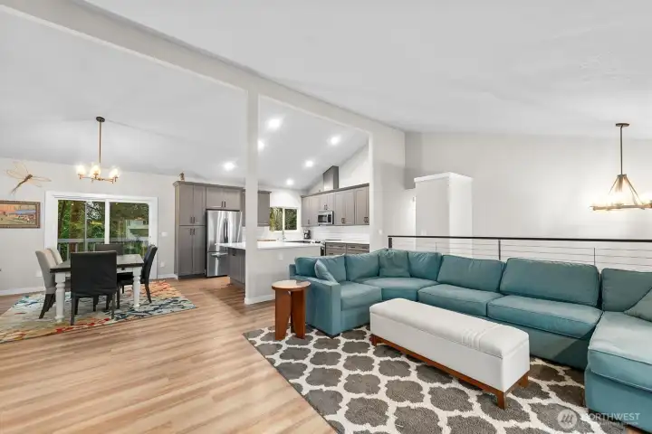 With incredible volume and abundant natural light, this space is perfect for gathering—whether relaxing with family or entertaining guests, everyone stays connected.