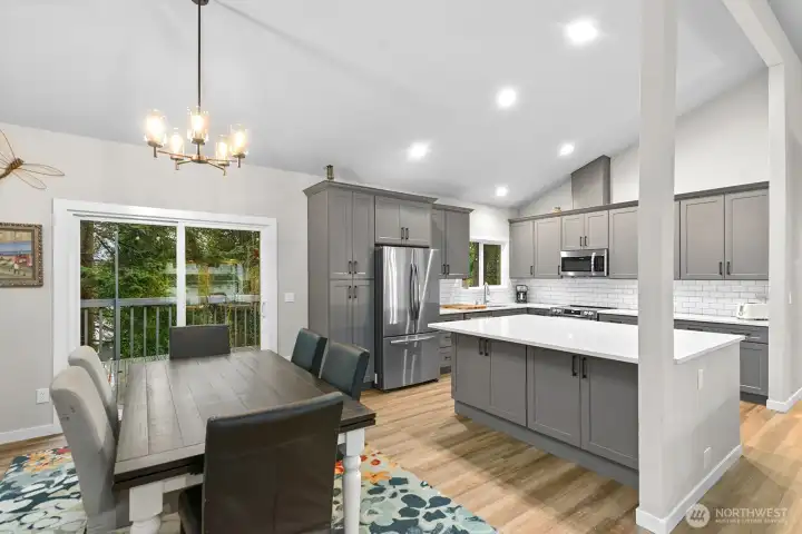 Enjoy easy interaction with guests at the dining table or around the large island—this space was designed for entertaining.