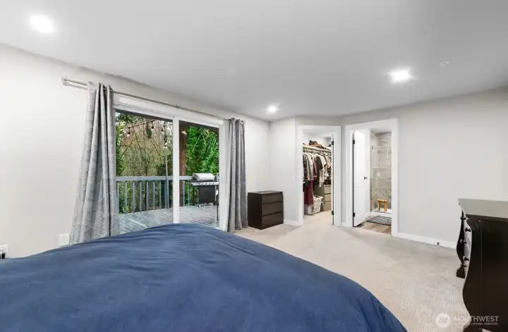 Enjoy peaceful treed views, private deck access, a walk-in closet, and a spa-inspired bath in the primary suite.