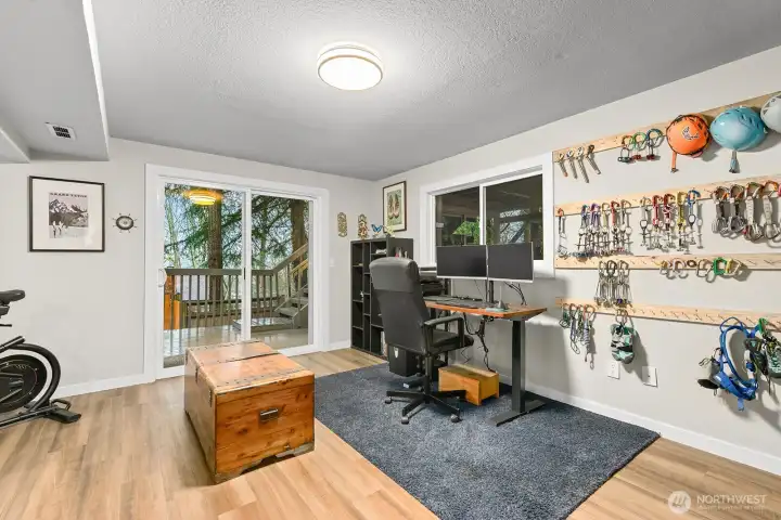 Step through the family room slider onto a generous two-tiered deck and side yard, perfect for entertaining and enjoying indoor-outdoor living.