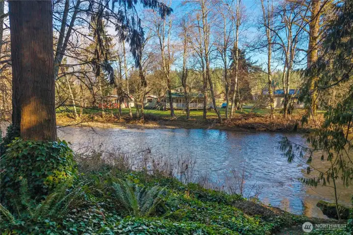Concrete steps down to the river on right hand side of this photo.