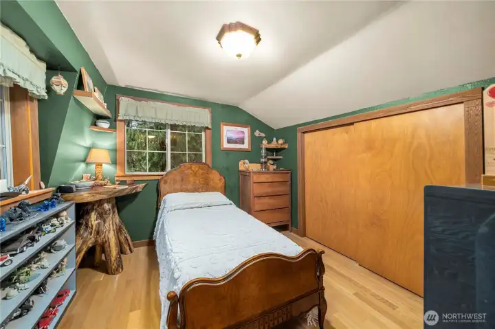 1 of 2 bedrooms on 2nd floor - built ins inside of closets.