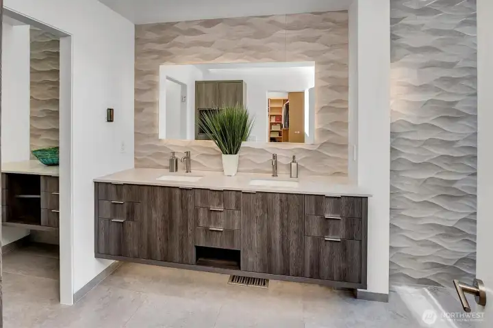 Primary bathroom with Porcelanosa large format floor tile and "wave" wall tile