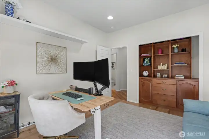 First floor office or bedroom, currently used as an office with incredibly beautiful built-in located in what was the closet.