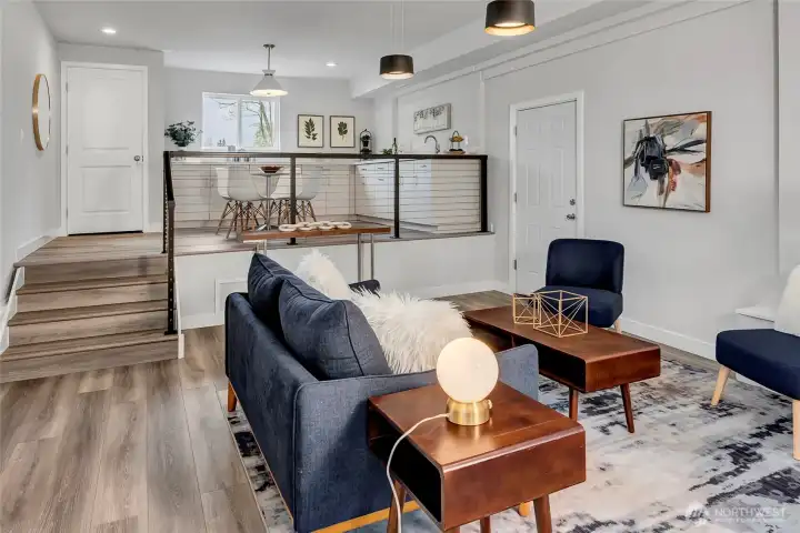 Newly finished lower level huge bonus space on two levels with separate entry: Work/Live/Play