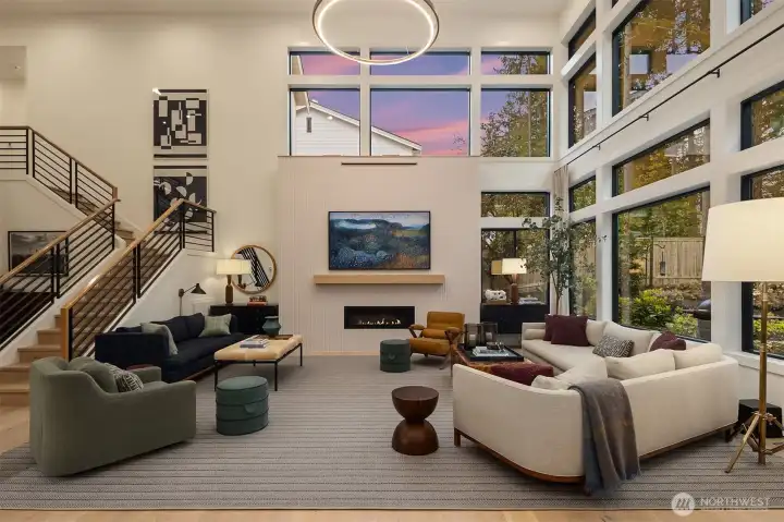 Where the day winds down — fireplace on, shoes off, the kind of room that makes it hard to remember why you ever went out.