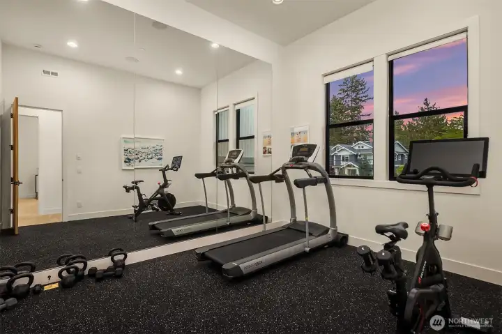 A dedicated gym with rubber flooring, floor-to-ceiling mirrors, and enough space to actually break a sweat. Skip the membership — this one's already yours.