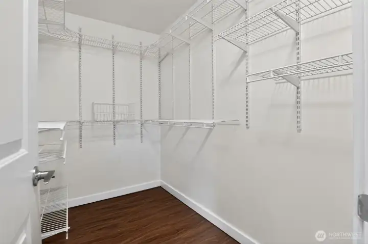 Primary walk-in closet Primary walk-in closet