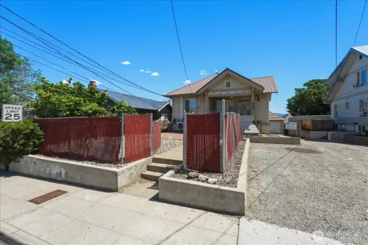 Fenced front yard area Fenced front yard area