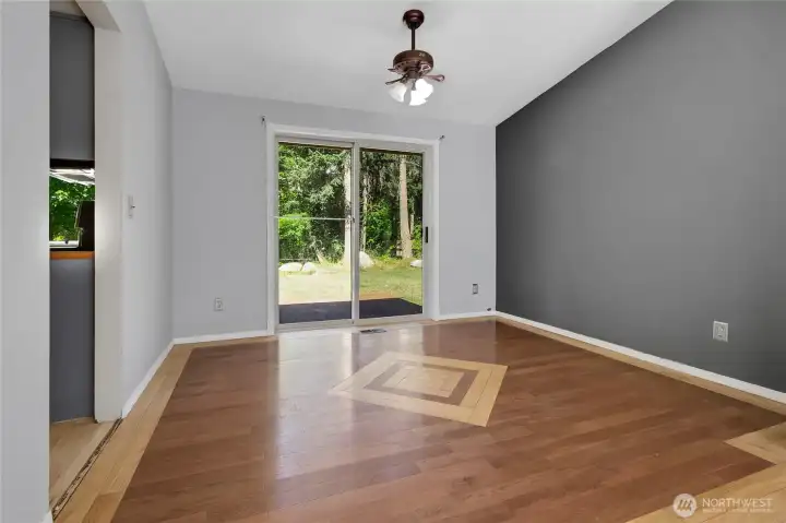 Dedicated dining space connected to kitchen for convenient everyday meals and entertaining.