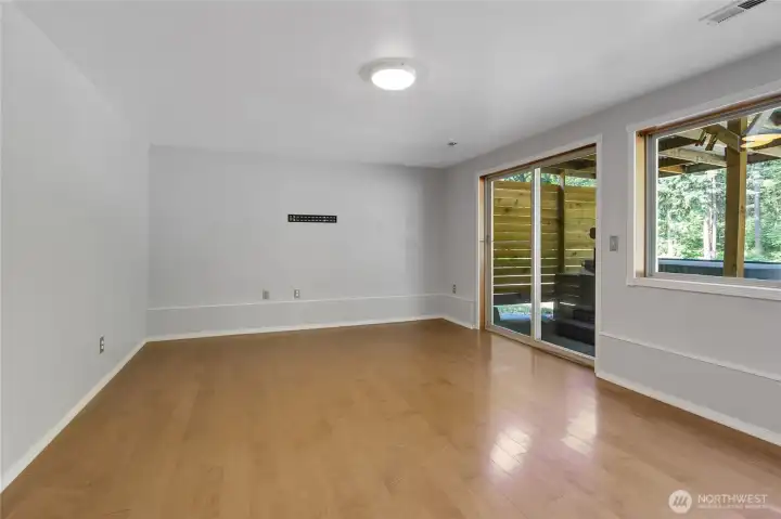 Additional flexible living space ideal for media room, office, or second gathering area.