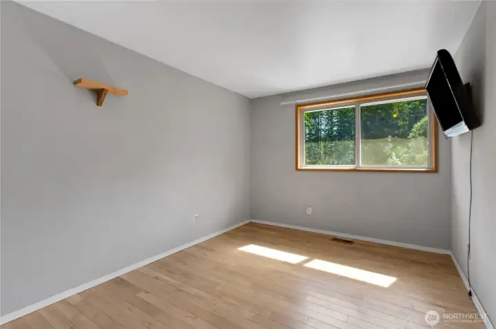 Well-sized secondary bedroom with natural light and flexible use for guests, office, or additional living space.
