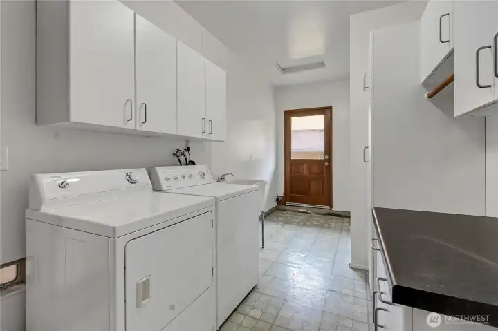 Laundry with access to garage and outside