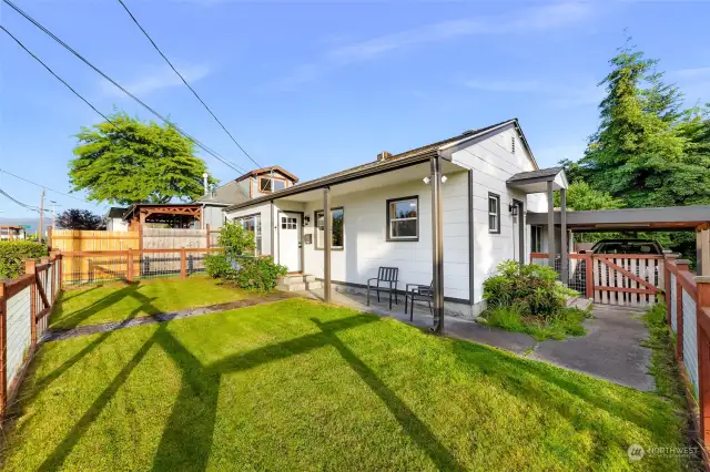 Spacious fully fenced front yard, providing a secure area for family pets to roam and play.