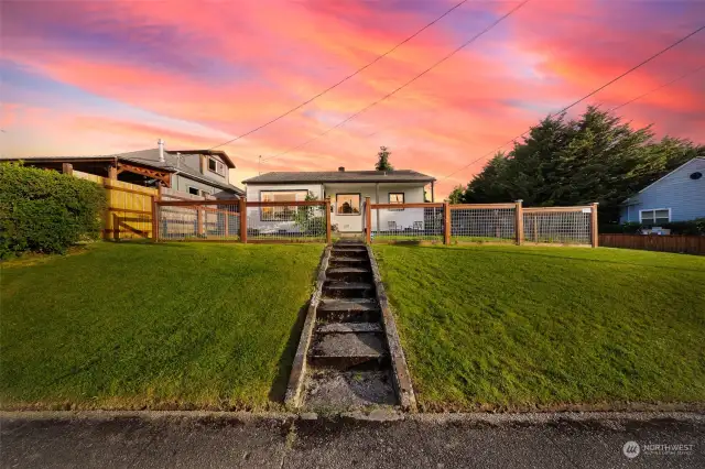 This home features a fully fenced front yard for those long summer days.