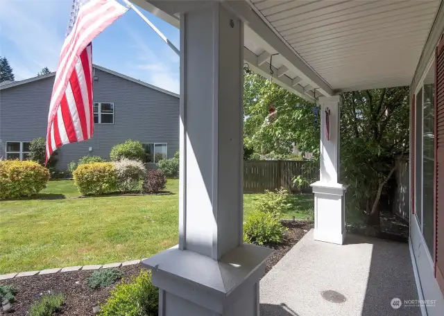 Front porch is a perfect place to admire the quiet cul-de-sac location.