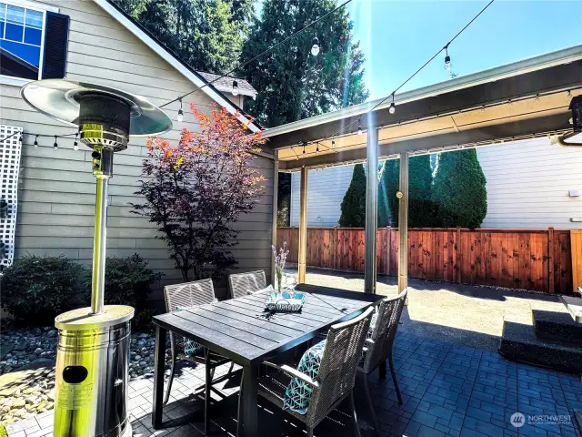 Perfect and private patio area between main house and detached garage.