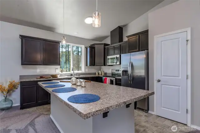All appliances stay with the sale. Nice large island for preparing feasts. Has a pantry!