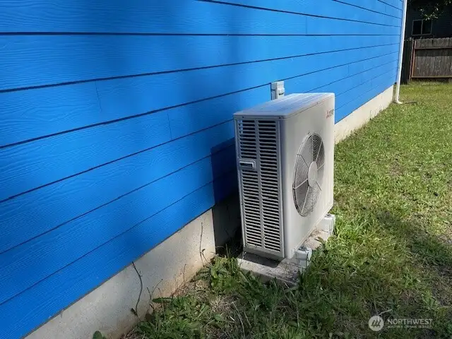 This summer home will be kept cool with this Mitsubishi Ductless System for heat and COOL!