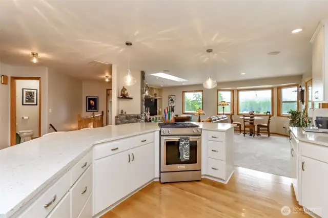 This bright and airy gourmet kitchen is designed for both functionality and style. Perfect for anyone who likes to cook and entertain.