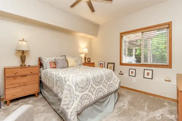 Large downstairs bedroom with ceiling fans