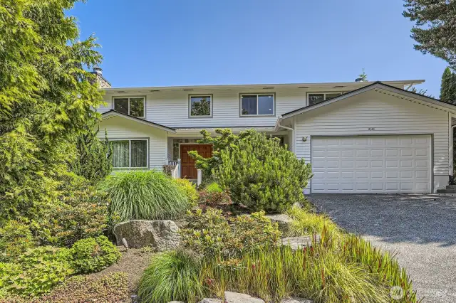 If you are looking for a home that has exquisite landscaping and seclusion, look no further.  The architectural composition roof is less than a year old with a transferrable warranty.