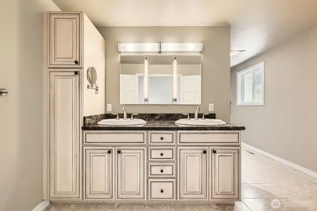 The luxurious ensuite bath features a well-thought out design with separation of space and excellent light.