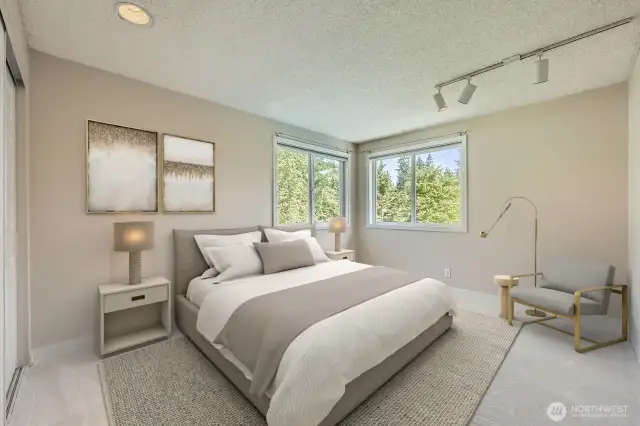 This corner bedroom has abundant light, new carpeting and 6-panel doors.