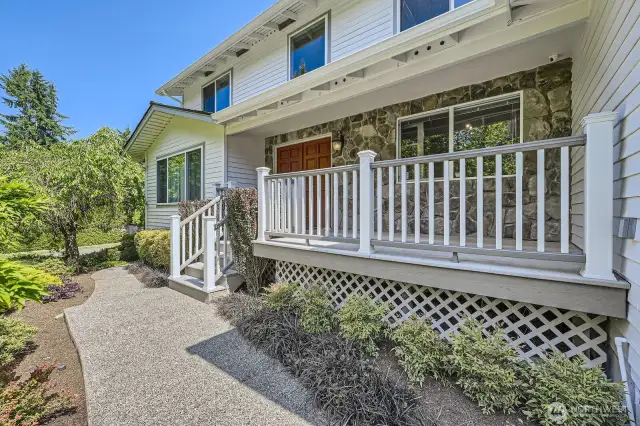You and your guests will feel right at home with the welcoming covered front porch, double door entry and cement concrete faux stone facade.