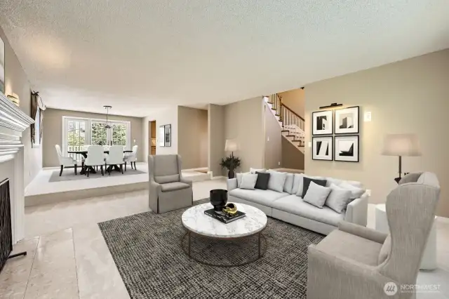 The spacious living and dining rooms feature brand new carpet and abundant light.